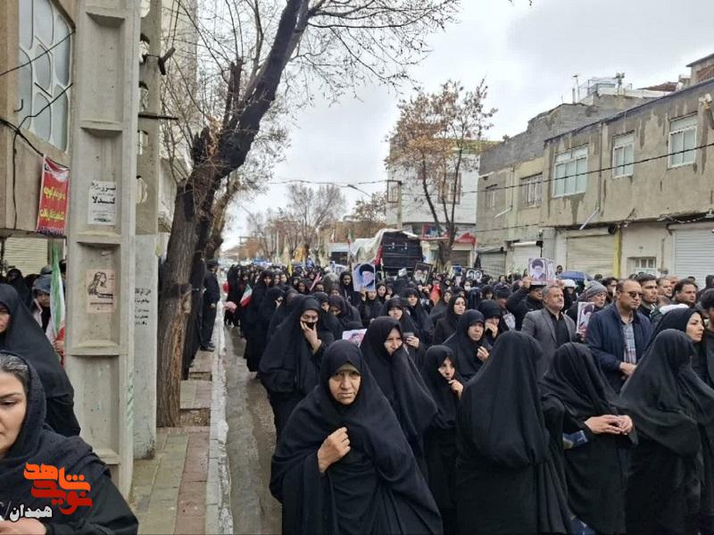 شهید امیرحسین حسنی در خاک آرام گرفت شهید امیرحسین حسنی در خاک آرام گرفت