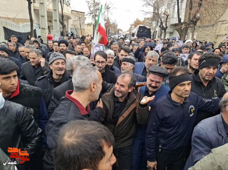 شهید امیرحسین حسنی در خاک آرام گرفت شهید امیرحسین حسنی در خاک آرام گرفت